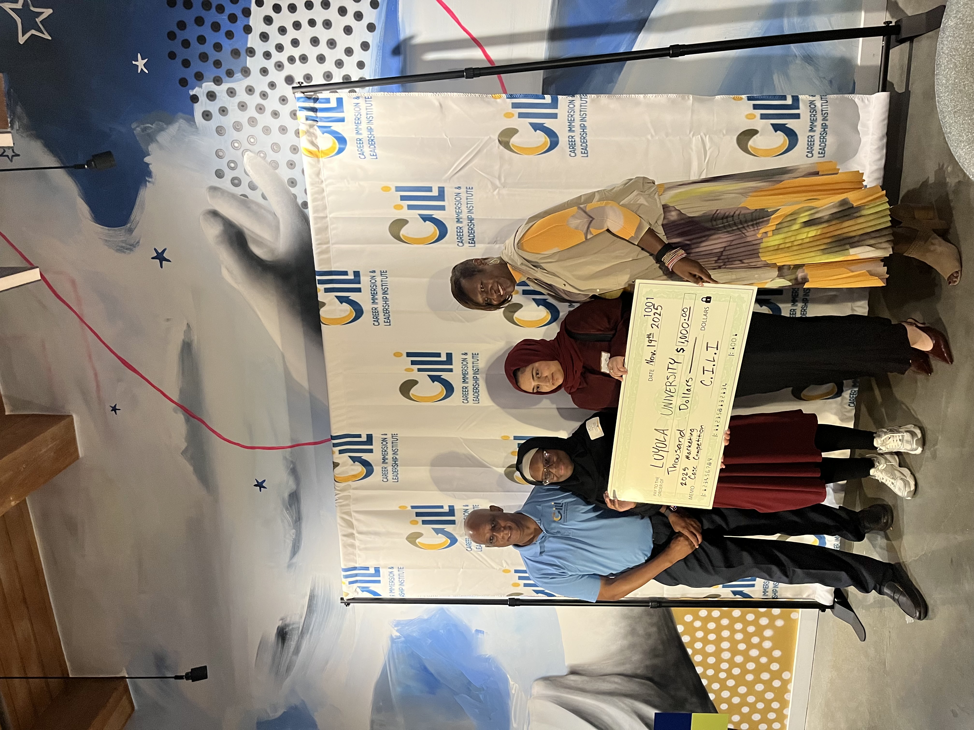 R&M Consulting founders with first place business competition award